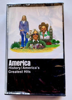 AMERICA - "History/ America's Greatest Hits" - Cassette Tape (1975/1994) [Digalog®] [Digitally Mastered] - <b style="color: purple;">SEALED</b>